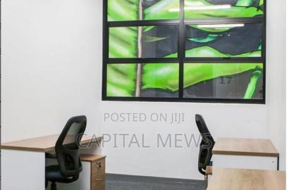 Executive Office With Leather Chairs And Large Desk
