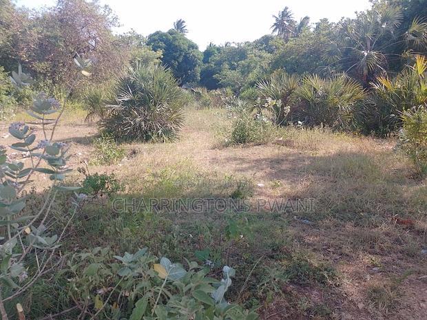 For Sale: Half Acre Corner Plot Along Mvindeni Road.