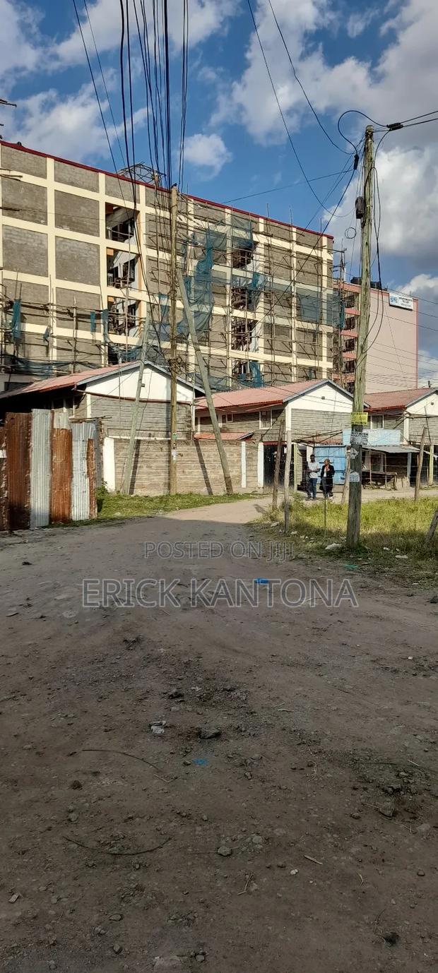 Titled 50*100comercial Plot at Astrol Utawala