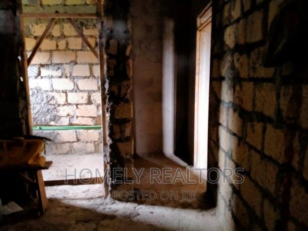 Half an Acre Land With a 3-Bedroom Bungalow in Kibiku, Ngong