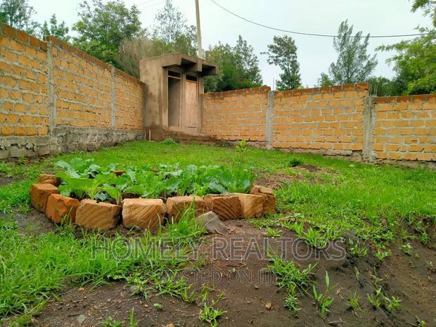Half an Acre Land With a 3-Bedroom Bungalow in Kibiku, Ngong
