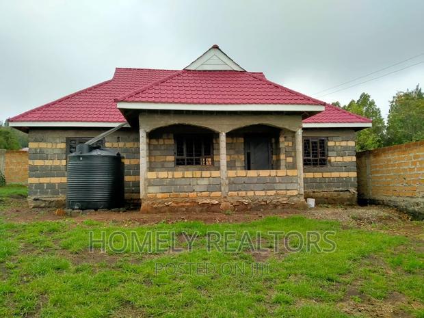 Half an Acre Land With a 3-Bedroom Bungalow in Kibiku, Ngong