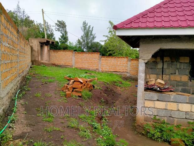 Half an Acre Land With a 3-Bedroom Bungalow in Kibiku, Ngong