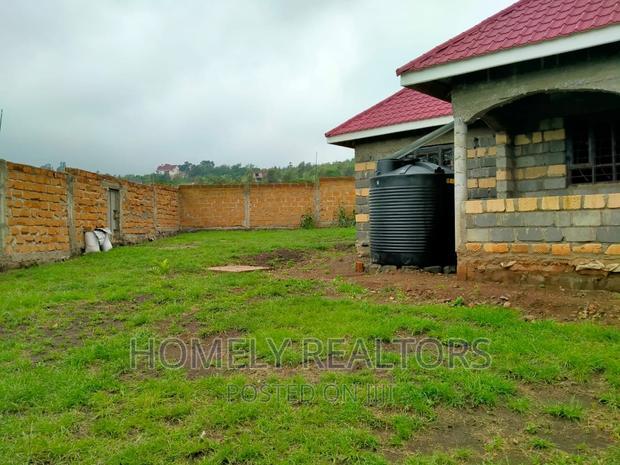 Half an Acre Land With a 3-Bedroom Bungalow in Kibiku, Ngong