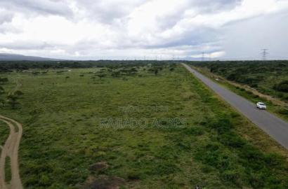 Prime 1 Acre Ewuaso Touching Tarmac at 3m