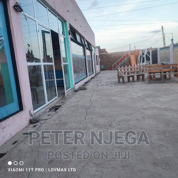 A Hall Sitting on 100x100 Plot for Lease