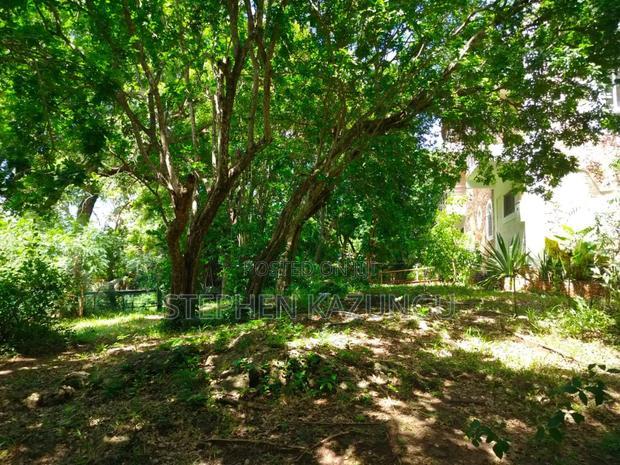 A 1.3/4 Acres Beach Plot on Sale in Diani Beach.