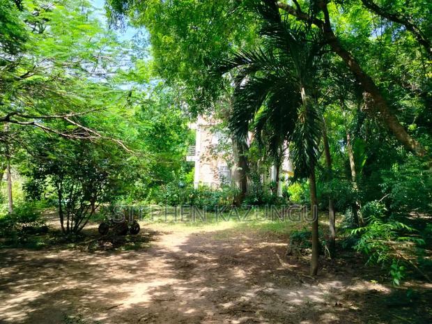 A 1.3/4 Acres Beach Plot on Sale in Diani Beach.