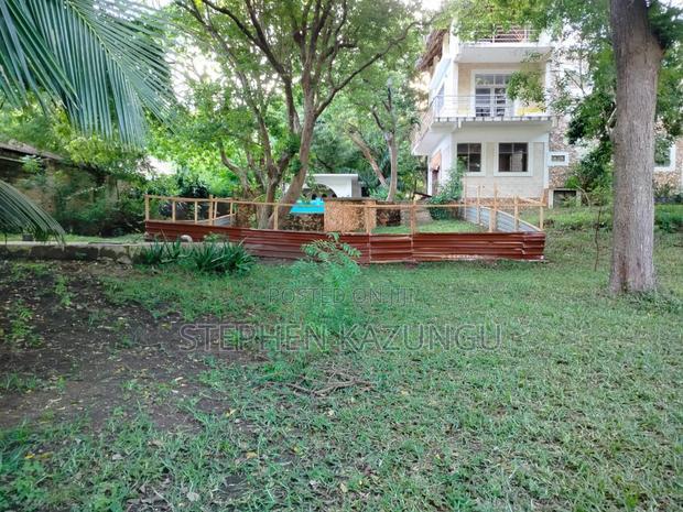 A 1.3/4 Acres Beach Plot on Sale in Diani Beach.