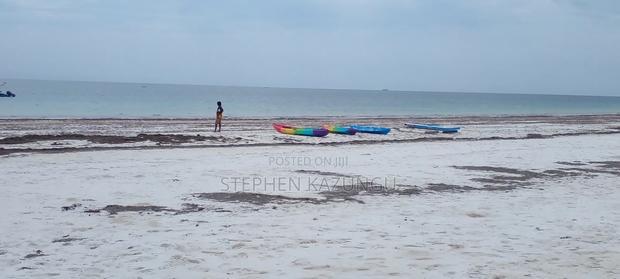 1 Acre Clear Sandy Beach Plot on Sale in Galu Beach