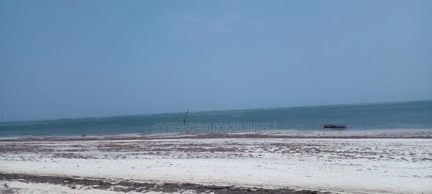 3 Acres Beach Plot Touching Clear Sandy on Blue Sea Water.