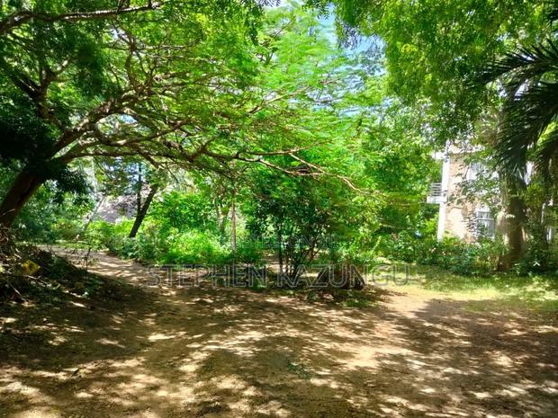 A 1.3/4 Acres Beach Plot on Sale in Diani Beach.