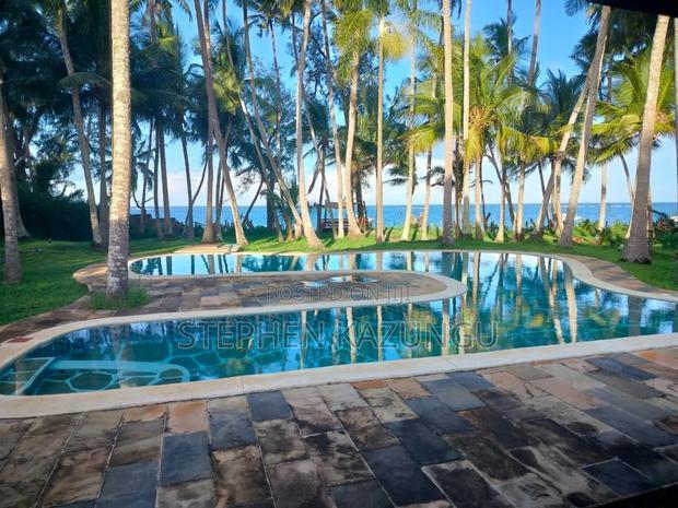 A 1.3/4 Acres Beach Plot on Sale in Diani Beach.