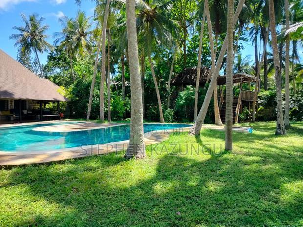 A 1.3/4 Acres Beach Plot on Sale in Diani Beach.