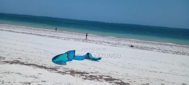 2 Acres 1/4 Beach Plot on Sale in Galu Beach