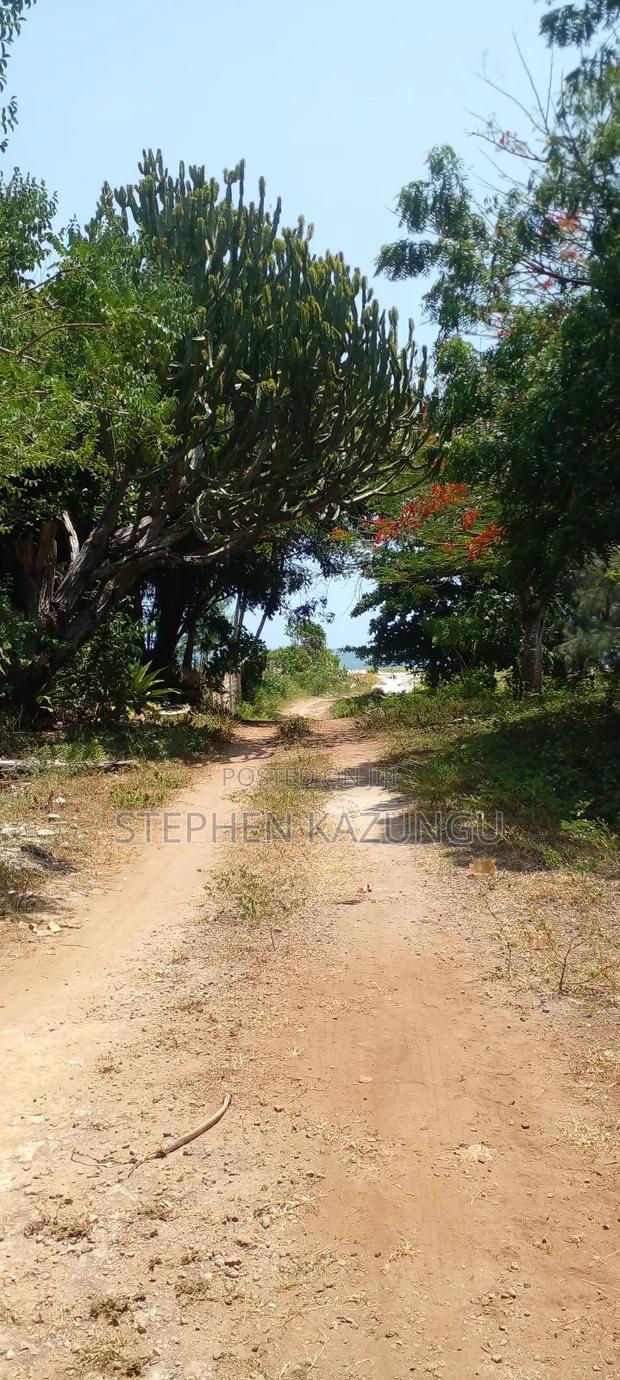 3 Acres Beach Plot Touching Clear Sandy on Blue Sea Water.