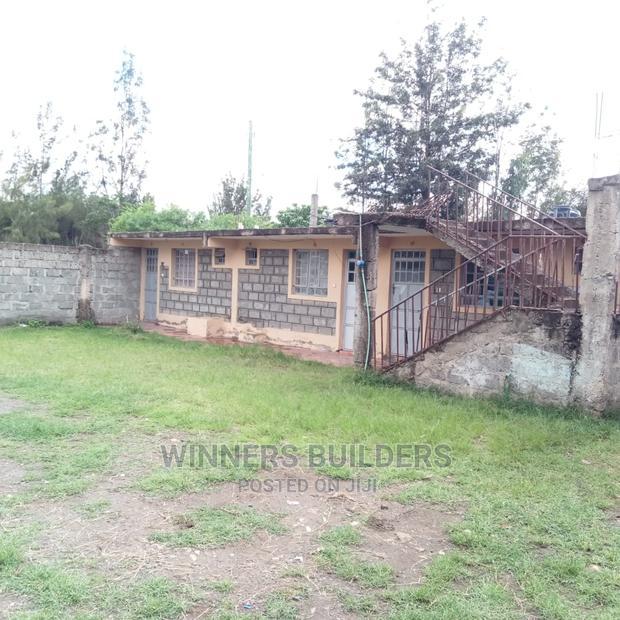 100 by 100 Plot for Sale at Utawala