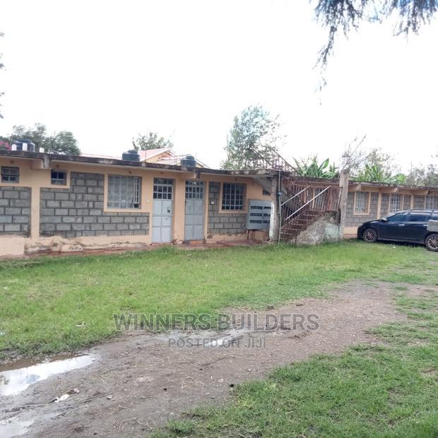 100 by 100 Plot for Sale at Utawala