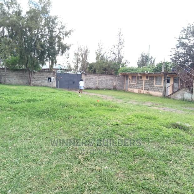 100 by 100 Plot for Sale at Utawala