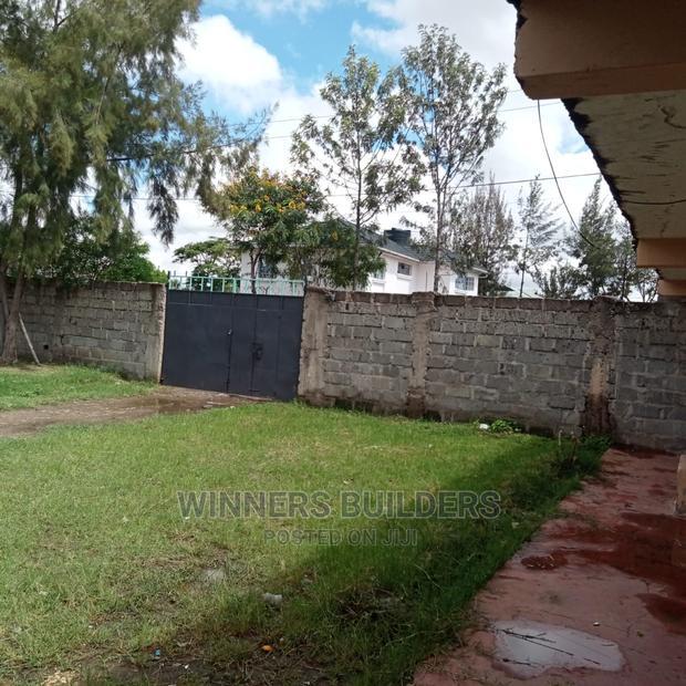 100 by 100 Plot for Sale at Utawala