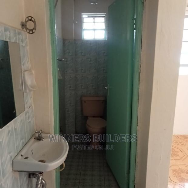 100 by 100 Plot for Sale at Utawala