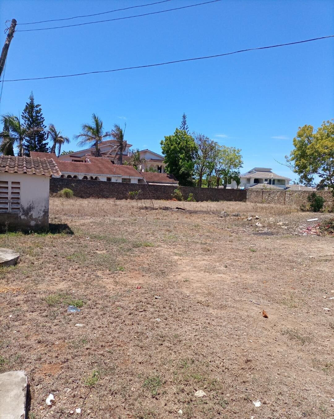 1/2 Acre Plot with 2BR Bungalow - KSh 25M