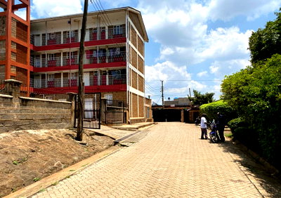 3-Acre Plot with Buildings in Kawangware