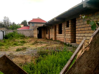 8th-Acre Plot With Incomplete Rental Flats in Matasia Ngong - Image 2