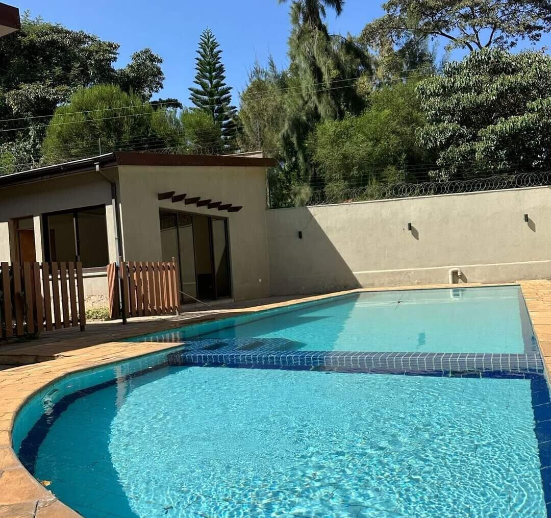 4BR Villa with DSQ on Half-Acre – Gated Karen Community