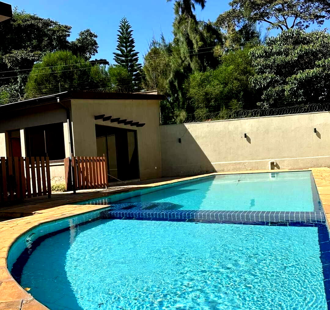 4BR Villa with DSQ on Half-Acre – Gated Karen Community