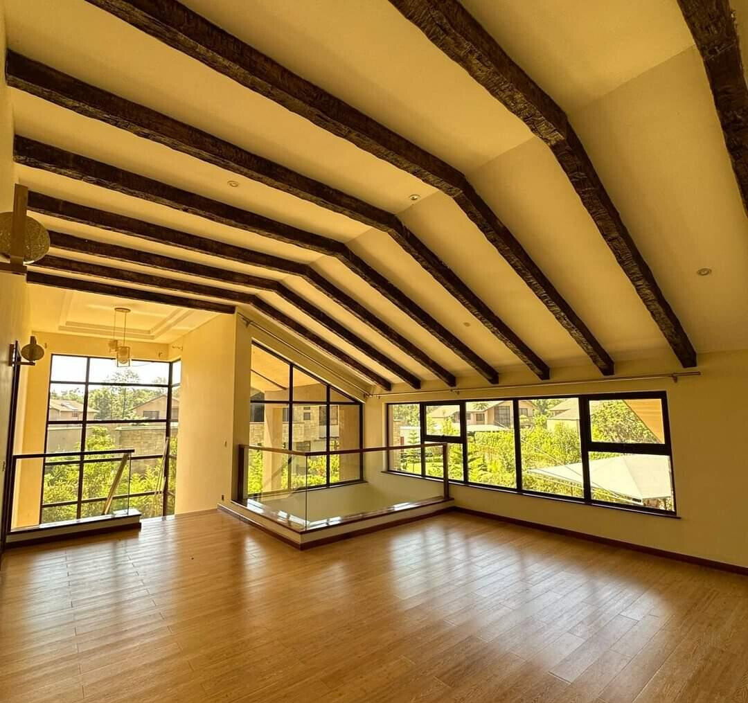 4BR Villa with DSQ on Half-Acre – Gated Karen Community