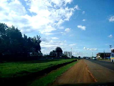 One Acre Langas Touching Tarmac With Title - Image 1