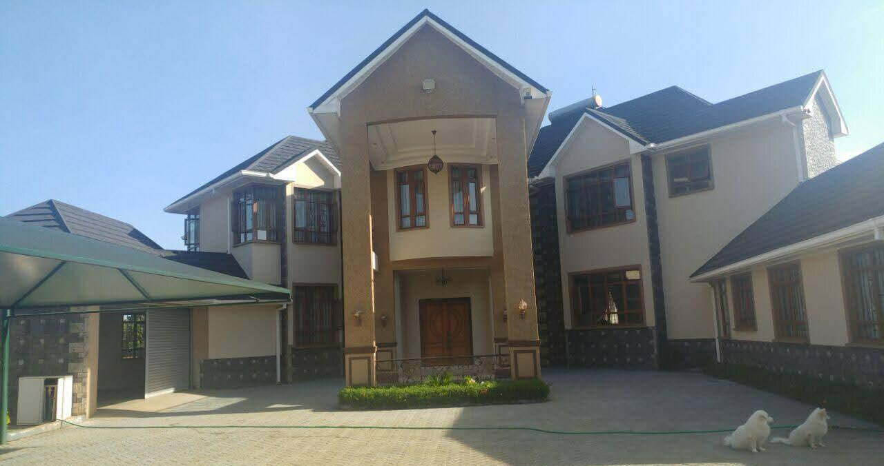 7BR All-Ensuite Townhouse with Gym, Jacuzzi & Home Theater - Runda