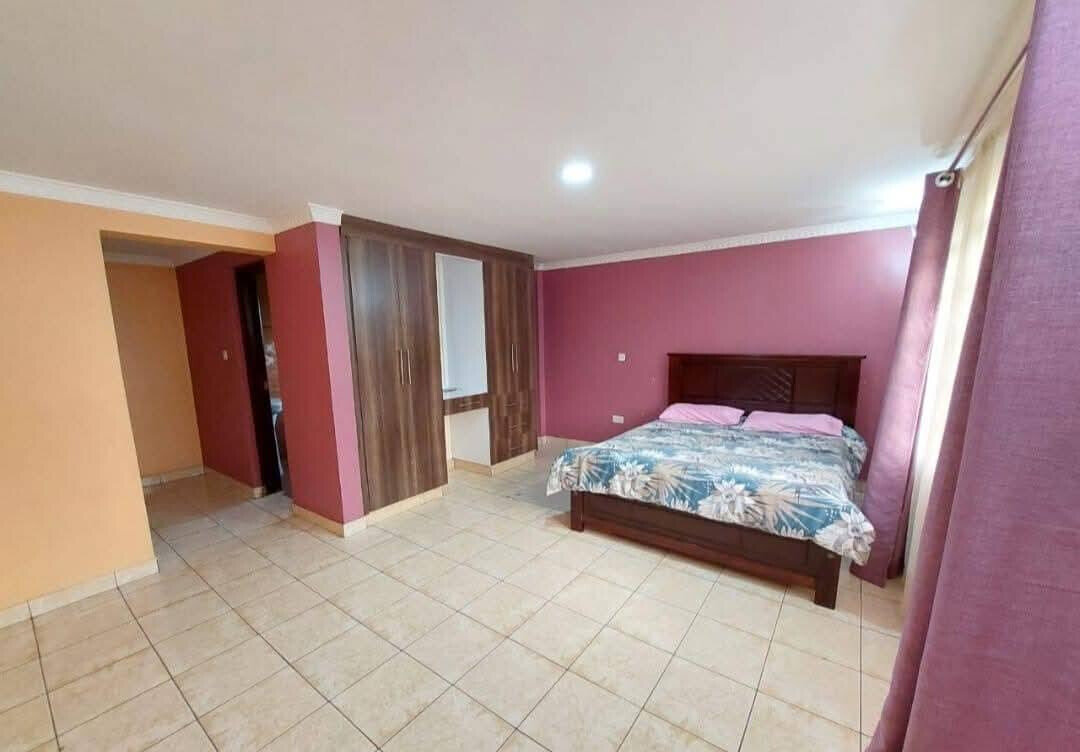 5BR All-Ensuite Townhouse on Quarter-Acre – Garden Estate
