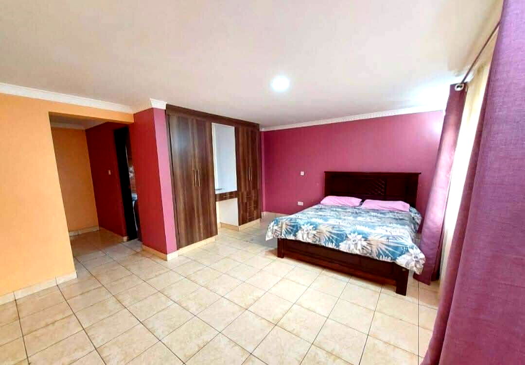 5BR All-Ensuite Townhouse on Quarter-Acre – Garden Estate