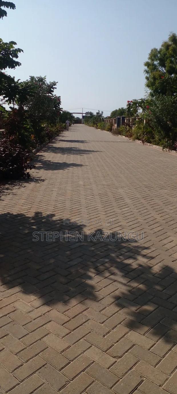 On Sale 1/2 Acre Beach Plot With House in It.