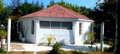 On Sale 1/2 Acre Beach Plot With House in It. - Image 1