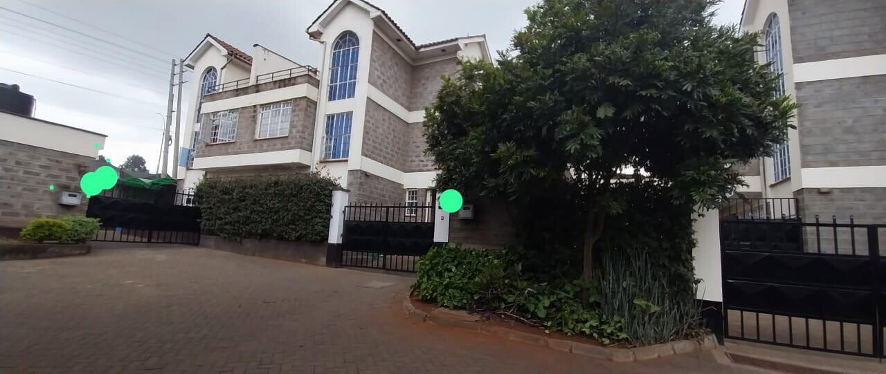 5BR Townhouse with Own Compound & Gate – Garden Estate