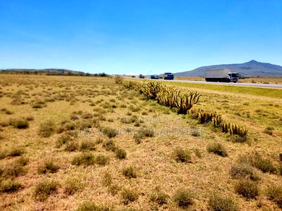 Get 1 Acre of Land That's Touching Tarmac for Just 6.5m - Image 1