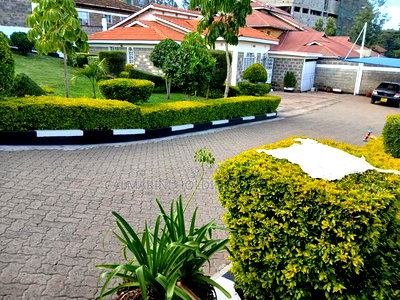 Prime Commercial Quarter Acre With a Bungalow in Ngong CBD - Image 1