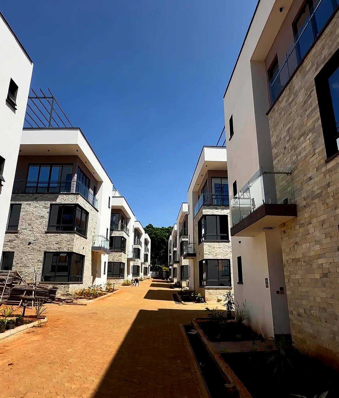 Modern 4-Ensuite Townhouse Steps from Lavington Mall