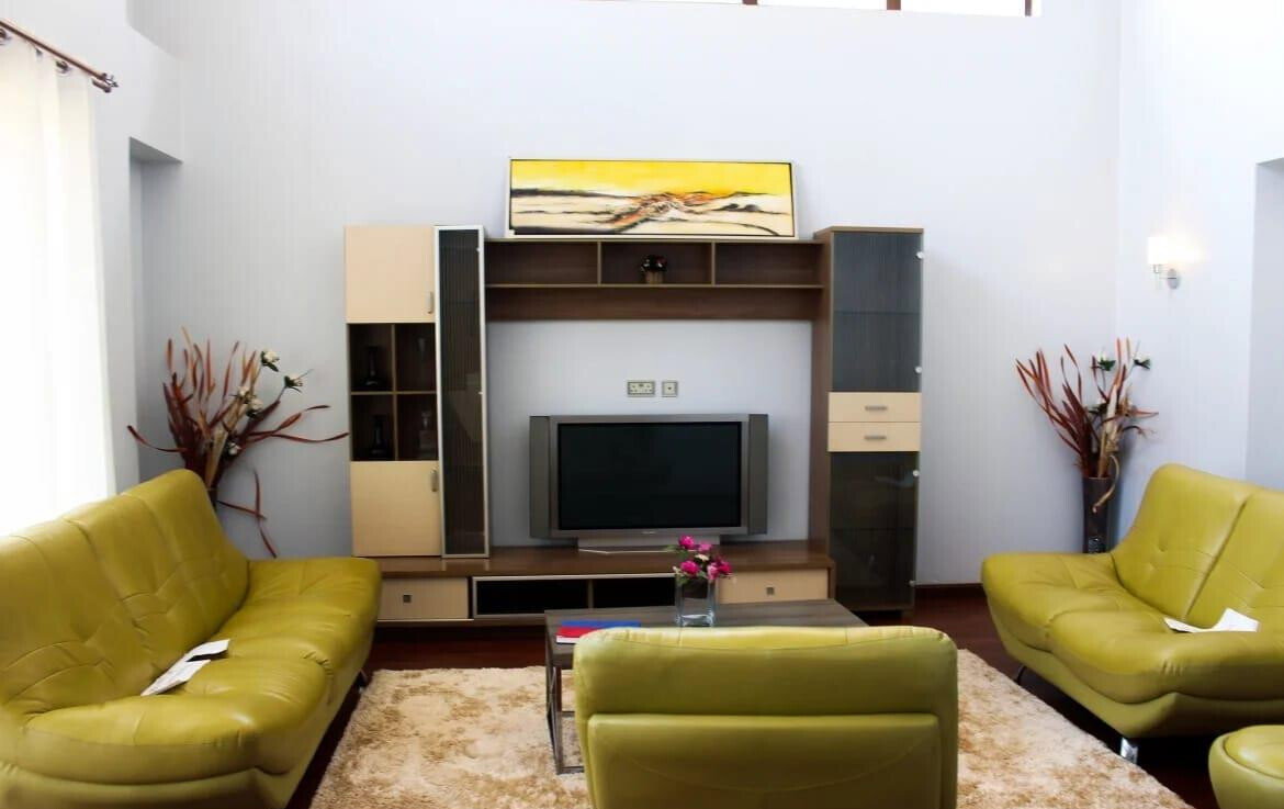 4BR Townhouse with Indoor-Outdoor Flow - UN Blue Zone, Runda