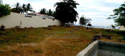 1 Acre Clear Sandy Beach Plot on Sale in Galu Beach - Image 1
