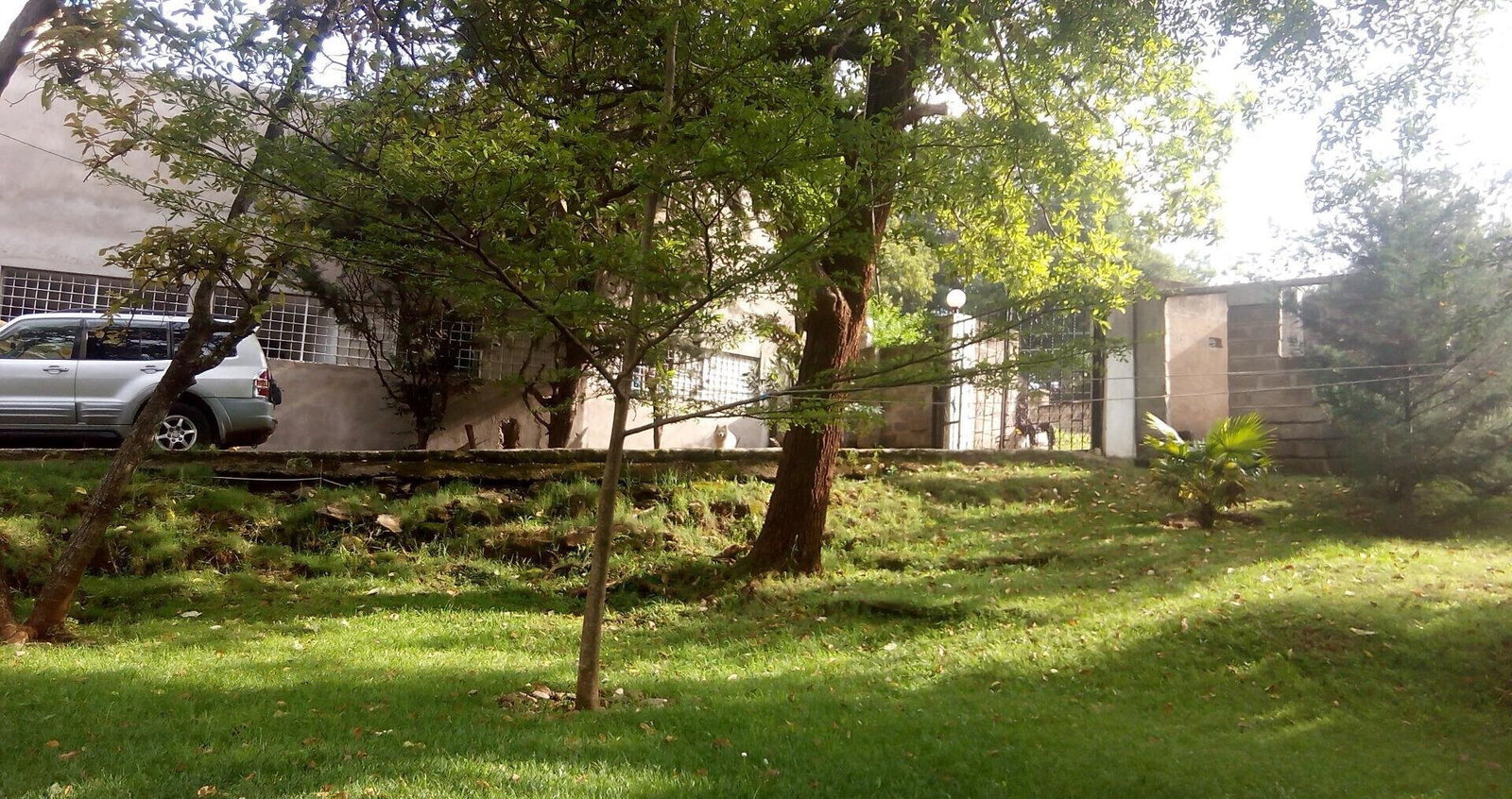 0.95-Acre Plot with Garden and Parking