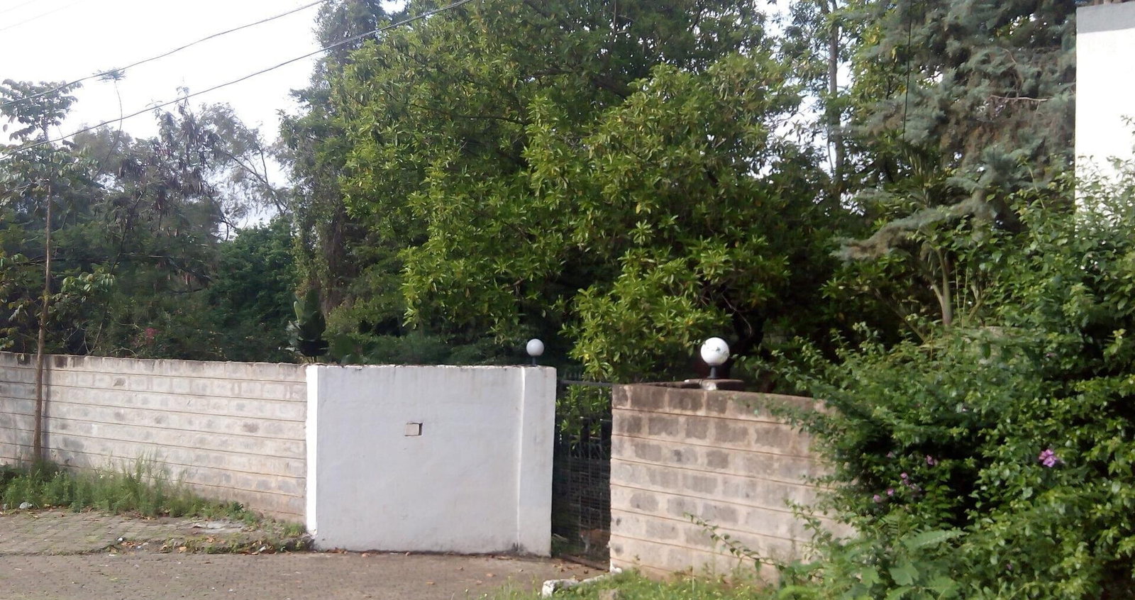 0.95-Acre Plot with Garden and Parking