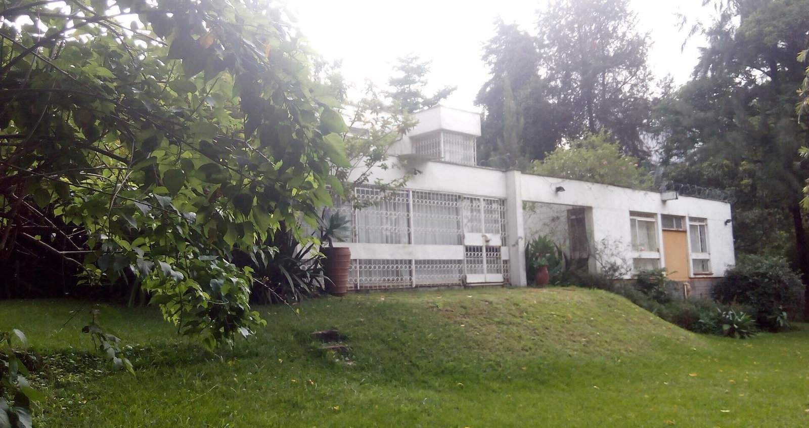 0.95-Acre Plot with Garden and Parking