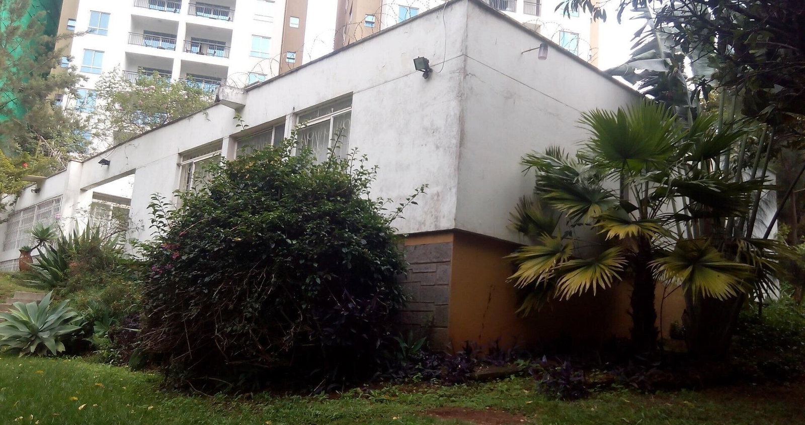 0.95-Acre Plot with Garden and Parking
