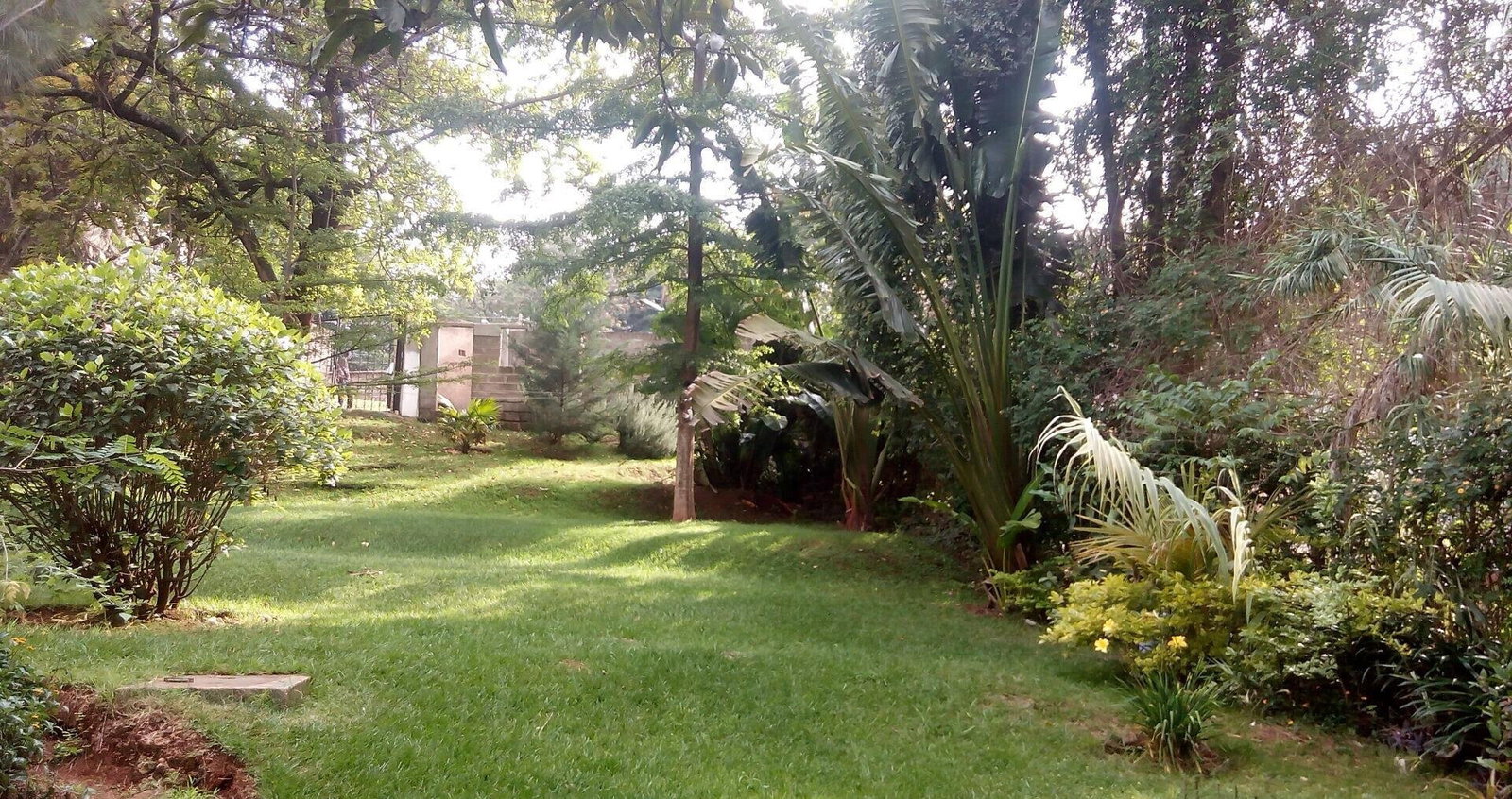 0.95-Acre Plot with Garden and Parking