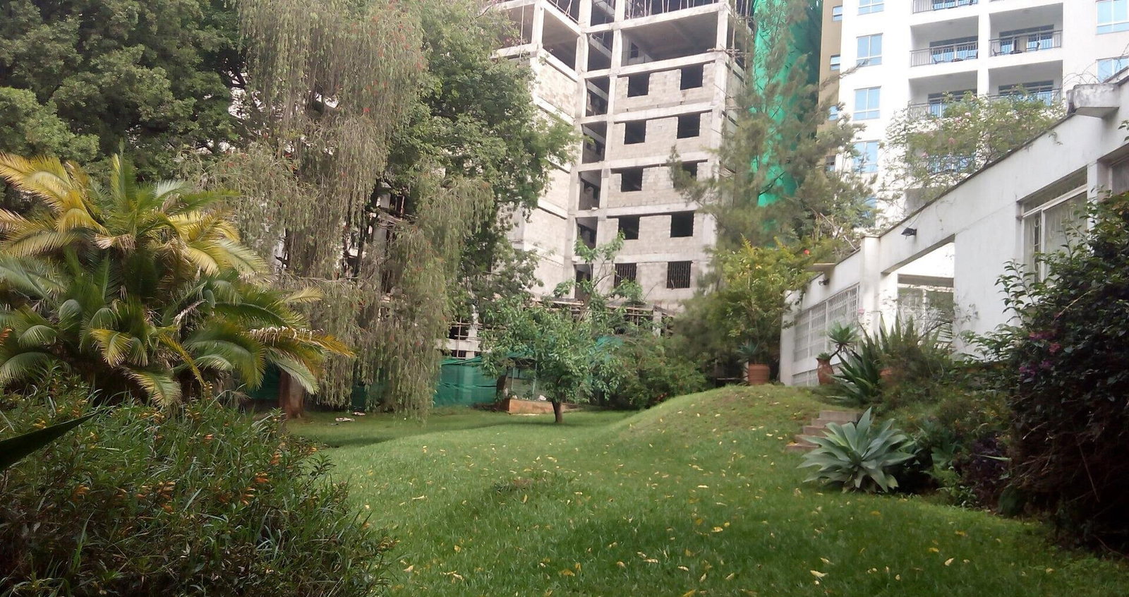 0.95-Acre Plot with Garden and Parking