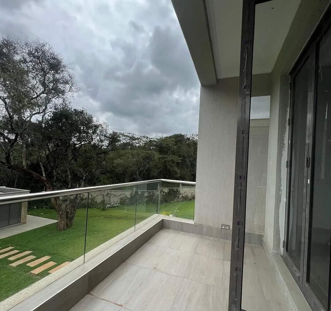 Jacaranda-Lined Drive Townhouse on Half-Acre – Karen